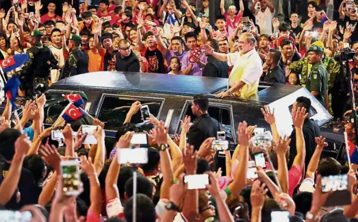  ??  ?? Royal factor: The Sultan of Johor is riding a popularity wave and the palace seems to be taking a clear stand on Johor’s politics. Picture shows the big welcome for the Sultan of Johor when he arrived in a special limousine for the annual Chingay parade last year.