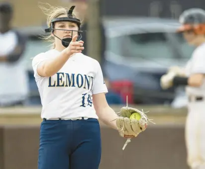  ?? VINCENT D. JOHNSON/DAILY SOUTHTOWN PHOTOS ?? Lemont’s Sage Mardjetko points to her outfielder­s after striking out a Shepard batter on Thursday.