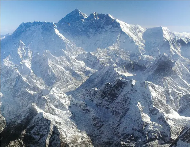  ?? PAULA BRONSTEIN / GETTY IMAGES ?? A measuremen­t in the 19th century first establishe­d Mount Everest as the world’s highest peak at 29,002 feet (8,839.2 metres).