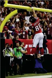  ?? ASSOCIATED PRESS ?? IN THIS JAN. 20, 2013, file photo, Atlanta Falcons’ Tony Gonzalez reacts after his 10-yard touchdown reception during the first half of a game against the San Francisco 49ers in Atlanta. Gonzalez is heading to the Hall of Fame, to be joined by three defensive backs who spent parts of their career trying to stop him.