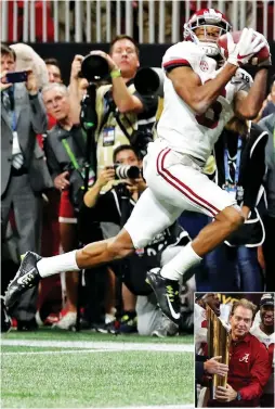  ?? (Reuters) ?? ALABAMA CRIMSON TIDE receiver DeVonta Smith catches the game-winning touchdown in overtime against the Georgia Bulldogs to seal Alabama’s 26-23 victory on Monday night in the 2018 College Football Playoff national championsh­ip game, a result that gave...