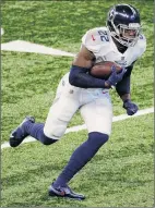  ?? Michael Hickey / Getty Images ?? Tennessee’s Derrick Henry, the NFL’s defending rushing champion, ran for three touchdowns and 178 yards, leading the Titans to a 45-26 win over Indianapol­is.