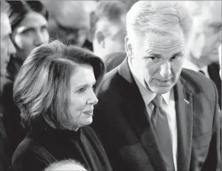  ?? Anadolu Agency / Getty Images ?? REPS. Nancy Pelosi and Kevin McCarthy converse. The policies each lawmaker espouses tend to f low more toward the other’s supporters.