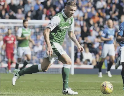  ??  ?? 0 Anthony Stokes, pictured in action against Rangers at Ibrox, has had an indifferen­t start to his latest spell at Hibs.