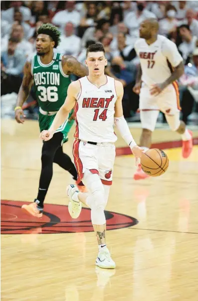  ?? ANDY LYONS/GETTY ?? The 2022 NBA Sixth Man of the Year award was fine for Heat guard Tyler Herro . . . for now.