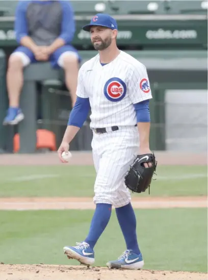  ?? AP ?? Tyler Chatwood reacts after serving up a three-run home run to Ian Happ during the Cubs’ intrasquad scrimmage Wednesday.