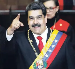 ?? AP ?? Venezuela’s President Nicolás Maduro greets guests after taking the oath of office at the Supreme Court in Caracas, Venezuela, yesterday. Maduro was sworn in to a second term amid internatio­nal calls for him to step down and a devastatin­g economic crisis.