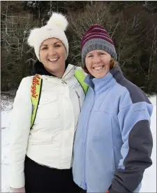  ??  ?? Louisa Higgins and Sheila Donelon enjoying the wintery conditions in Roundwood.