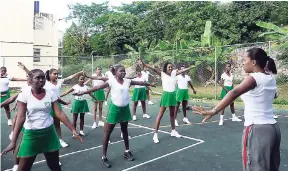  ?? FILE PHOTOS ?? Students of Montego Bay High School during their physical education class, with teacher Rowena Blackwood.