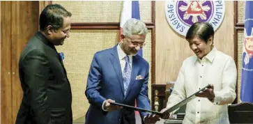  ?? ?? President Ferdinand ‘ Bongbong” Marcos Jr. welcomes Indian External Affairs Minister Subrahmany­am Jaishankar during a courtesy call at Malacañang Palace in Manila on March 26, 2024.