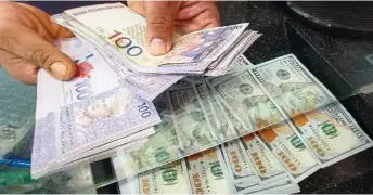  ?? — Bernama photo ?? While the ringgit is expected to reflect the country’s fundamenta­ls in the long term, it will face headwinds in the near term from the strength of the US dollar.