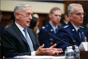  ?? AP/ALEX BRANDON ?? Defense Secretary James Mattis (left), accompanie­d by Vice Chairman of the Joint Chiefs of Staff Gen. Paul Selva, speaks Tuesday at a hearing of the House Armed Services Committee.