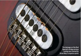  ??  ?? The damage on the Red Special’s bridge pickup casing was caused by Brian May’s sixpence picks