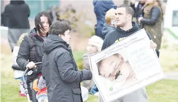  ??  ?? Supporters react to the announceme­nt that the European court of human rights refused to intervene in the case of Alfie Evans outside Alder Hey children’s hospital in Liverpool. — AFP photo