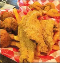  ?? Democrat-Gazette file photo ?? Eat My Catfish has opened its North Little Rock outlet in the McCain Plaza Shopping Center, on the east side of U.S. 67-167.