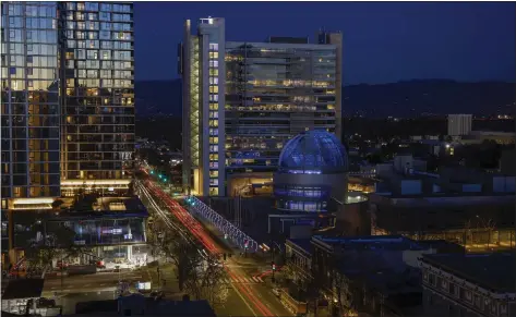  ?? NHAT V. MEYER — STAFF ARCHIVES ?? San Jose City Hall is illuminate­d in the colors of the Ukrainian flag in support of Ukraine in downtown San Jose on Feb. 28.