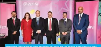  ??  ?? Ambassador Sheikh Salem Al-Sabah with Waleed Al-Khashti and Zain officials at the company’s booth.