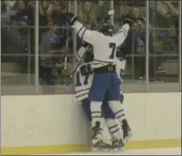  ?? BY JOE BOYLE JBOYLE@DIGITALFIR­STMEDIA.COM @BOYLERALER­TTROY ON TWITTER ?? LaSalle Institute celebrates after scoring on February 9at the Hudson Valley Community College Rink.