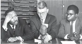  ??  ?? Mr. Bola Ige, co- secretary of the 18th Ecumenical Student Conference ( right) held at the University of Ohio, Athens Ohio, Rev. Martin Luther King jnr ( left) and another guest at the daily news briefing during the conference which held between December 27, 1959 and January 2, 1960.