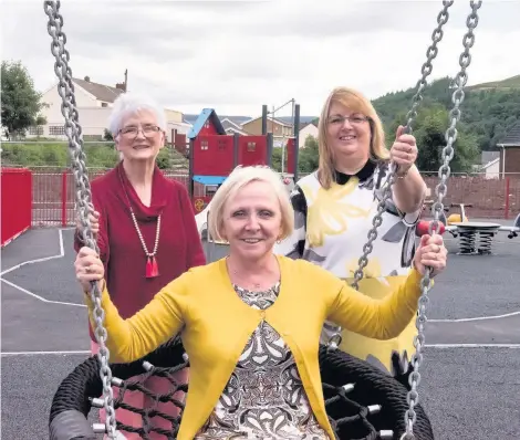  ??  ?? Councillor­s Anita Calvert, Ann Crimmings and Tina Williams at the new play area for children of all ages in Cwmaman