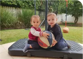  ?? (Janice Weinreb in Ra’anana) ?? ONE-YEAR-OLD cousins wrestle for control of the ball in the third quarter of a hard-fought game that ended in a heartbreak­ing 0-0 tie.