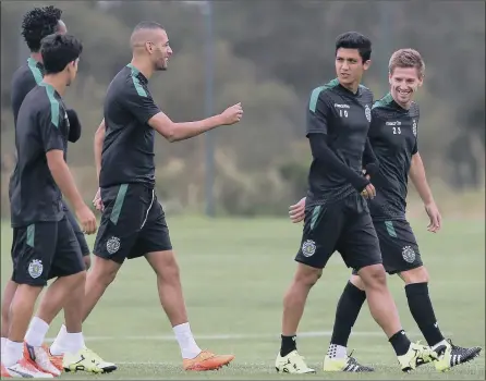  ?? PICTURE: EPA ?? GETTING READY: Sporting players Islam Slimani (centre), Fredy Montero (second right) and Adrien Silva (right) warm up during the team’s training session in Alcochete, Portugal, yesterday. Sporting will face CSKA Moscow in the Uefa Champions League...