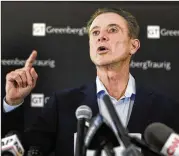  ?? SETH WENIG / AP ?? Ex-Louisville coach Rick Pitino, talking to reporters Wednesday at a news conference in New York, said the NCAA punishment of the Cardinals is unfair.