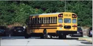  ?? H John Voorhees III / Hearst Connecticu­t Media file photo ?? A school bus on Aug. 25 at Hill and Plain Elementary School in New Milford.