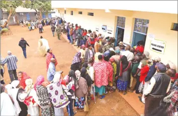  ??  ?? People queue to cast their ballots at a polling station in Nairobi yesterday as Kenyans held presidenti­al elections