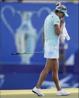  ?? ALEX GALLARDO, THE ASSOCIATED PRESS ?? Lexi Thompson composes herself on the 18th green on Sunday. She eventually lost in a playoff.