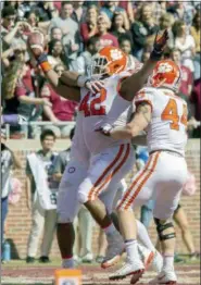  ?? MARK WALLHEISER — THE ASSOCIATED PRESS ?? Clemson’s Christina Wilkins (42) celebrates his touchdown in the first half of a college football game against Florida State in Tallahasse­e, Fla., Saturday.