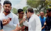  ?? — PTI ?? Congress vice-president Rahul Gandhi has an argument with police personnel while on the way from Neemuch to Mandsaur on Thursday.