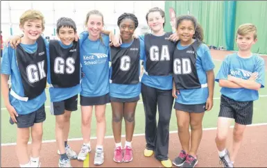  ?? FM4405124 above, FM4405083 left, FM4405071 right ?? Above, Palace Wood’s netball squad, left, Aylesford youngsters (green) take on Vigo in the tag rugby event, and, right, pupils from the Oaks Academy, Maidstone, line up ready to score some tries. More than 80 schools and 2,000 children took part in...