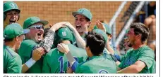  ??  ?? Chaminade Julienne players greet Garrett Wissman after he hit his two-run homer in the first inning. He added an RBI double in the sixth inning that proved to be the winning hit.