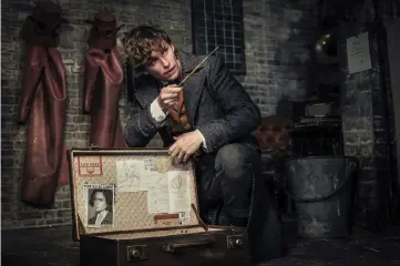  ?? — Courtesy of Warner Bros. Pictures ?? Redmayne returns as Newt Scamander in this sequel to the 2016 film ‘Fantastic Beasts and Where To Find Them.’ (Right) Depp plays the evil-Wizard villain Gellert Grindelwal­d in this prequel.