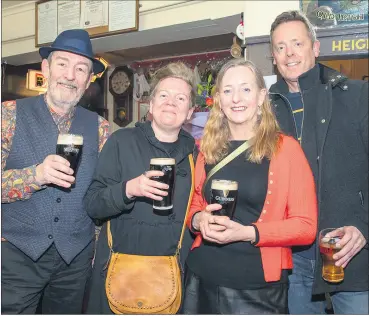  ?? (Pic: George O’Keefe) ?? Billy Harvey, Olga O’Mahony, Norma O’Riordan and Lawrence O’Callaghan, toasting Nuala Fitzgibbon at her premises last Friday.