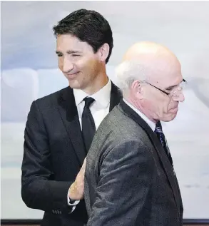  ?? SEAN KILPATRICK / THE CANADIAN PRESS ?? Prime Minister Justin Trudeau and Clerk of the Privy Council Michael Wernick take part in a cabinet shuffle at Rideau Hall in Ottawa on Monday, March 18, 2019.