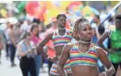  ??  ?? Marlon McShan of the Memphis Galaxy 16 prepare to march in the Mid-South Pride parade through Beale Street in Downtown Memphis Saturday. JOE RONDONE / THE COMMERCIAL