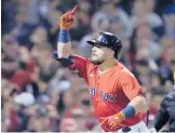  ?? CHARLES KRUPA/AP ?? Kyle Schwarber celebrates his solo home run during the Red Sox’s 6-2 victory over the Yankees in the AL wild-card game Tuesday night in Boston.