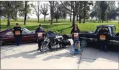  ?? ELIZA GREEN / THE CALIFORNIA­N ?? From left, Angel Trujillo, Jose Hernandez, Yvette Espinoza, Elijah Espinoza and John Cortez pose with some examples of what attendees will be able to see at the event put on by the Carnales Unidos car club.