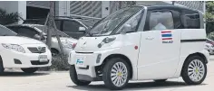  ?? PAWAT LAOPAISARN­TAKSIN ?? A four-seater compact EV developed by FOMM is on show.