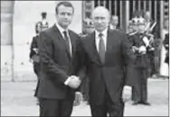  ??  ?? Emmanuel Macron et Vladimir Poutine