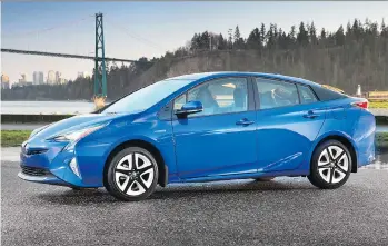  ??  ?? Despite its widespread appeal, traditiona­lists decried the angular front-end and sculpted hood of the Prius, but Toyota maintains the front-end design reduces drag, thus adding to fuel efficiency.