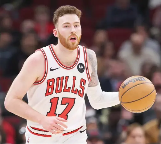  ?? MICHAEL REAVES/GETTY IMAGES ?? Swingman Onuralp Bitim had 10 points and six rebounds in 27 minutes in the Bulls’ double-overtime victory Wednesday against the Cavaliers.