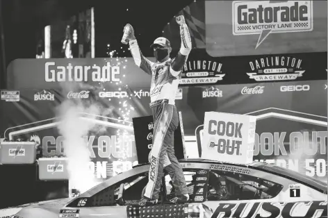  ?? ASSOCIATED PRESS ?? KEVIN HARVICK (4) celebrates a win at the NASCAR Cup Series auto race Sunday in Darlington, S.C.