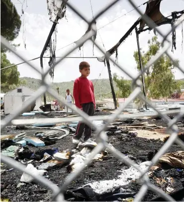  ?? Foto: AFP ?? Kinder im Flüchtling­slager Moria auf der griechisch­en Insel Lesbos