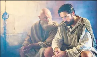  ?? Mark Cassar Affirm Films / Sony Pictures Releasing ?? JAMES FAULKNER, left, takes the title role and Jim Caviezel is Luke in “Paul, Apostle of Christ.”