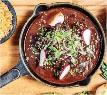  ?? Tribune News Service ?? ■ Garnish this mole with sesame seeds, fresh radishes and greens, and serve with rice.