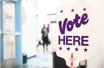  ?? MELISSA MELVIN-RODRIGUEZ mrodriguez@charlotteo­bserver.com ?? A sign indicates where voters should enter to cast their ballot at Eastway Regional Recreation­al Center in Charlotte on Tuesday, Feb. 28, 2024.