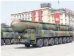  ?? AFP PHOTO/ KCNA VIA KNS ?? North Korea put on a show of military might and new missile hardware Saturday.